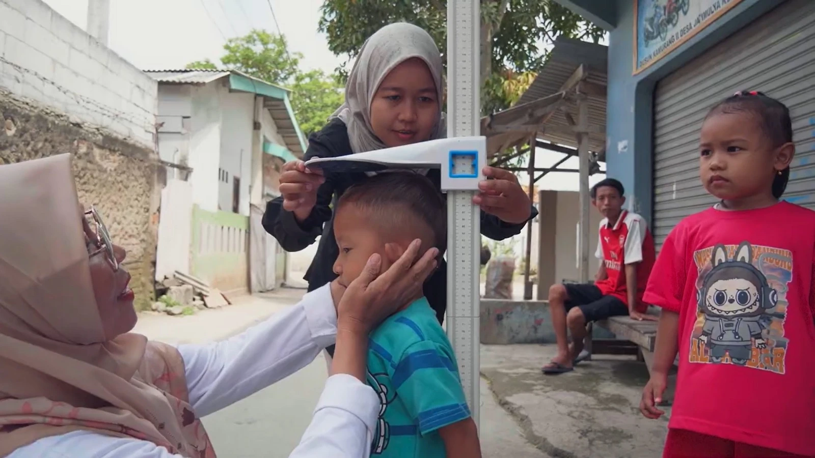 For child nutrition (ZeroStunting), we track the same children over time. We measure stunting (height-for-age) and underweight (weight-for-age) using Indonesia's Ministry of Health child growth standards, with anthropometric measurements taken by trained enumerators using calibrated equipment at baseline (enrollment) and endline (six months later). This is a pre-post design without a control group, which means we report it as an observed change in enrolled children, not a causal claim — other factors, including normal growth patterns, may also contribute.